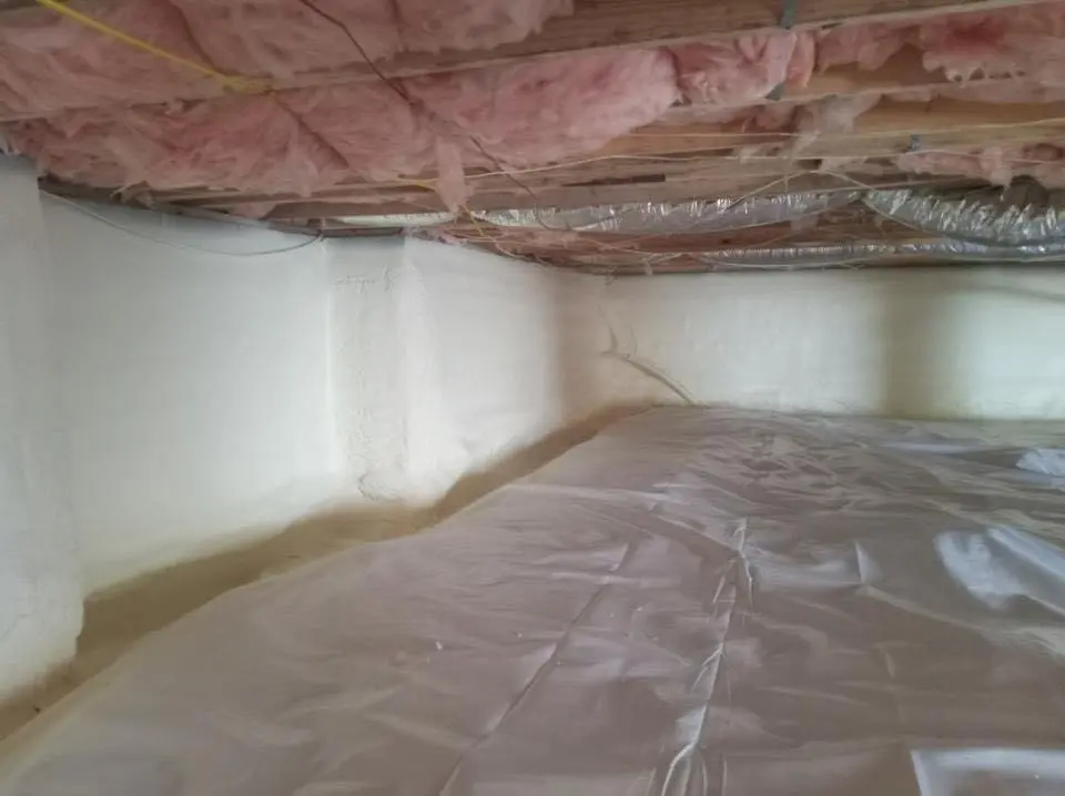Crawl space encapsulation with closed-cell spray foam for Flat Roof Repair in Hartland